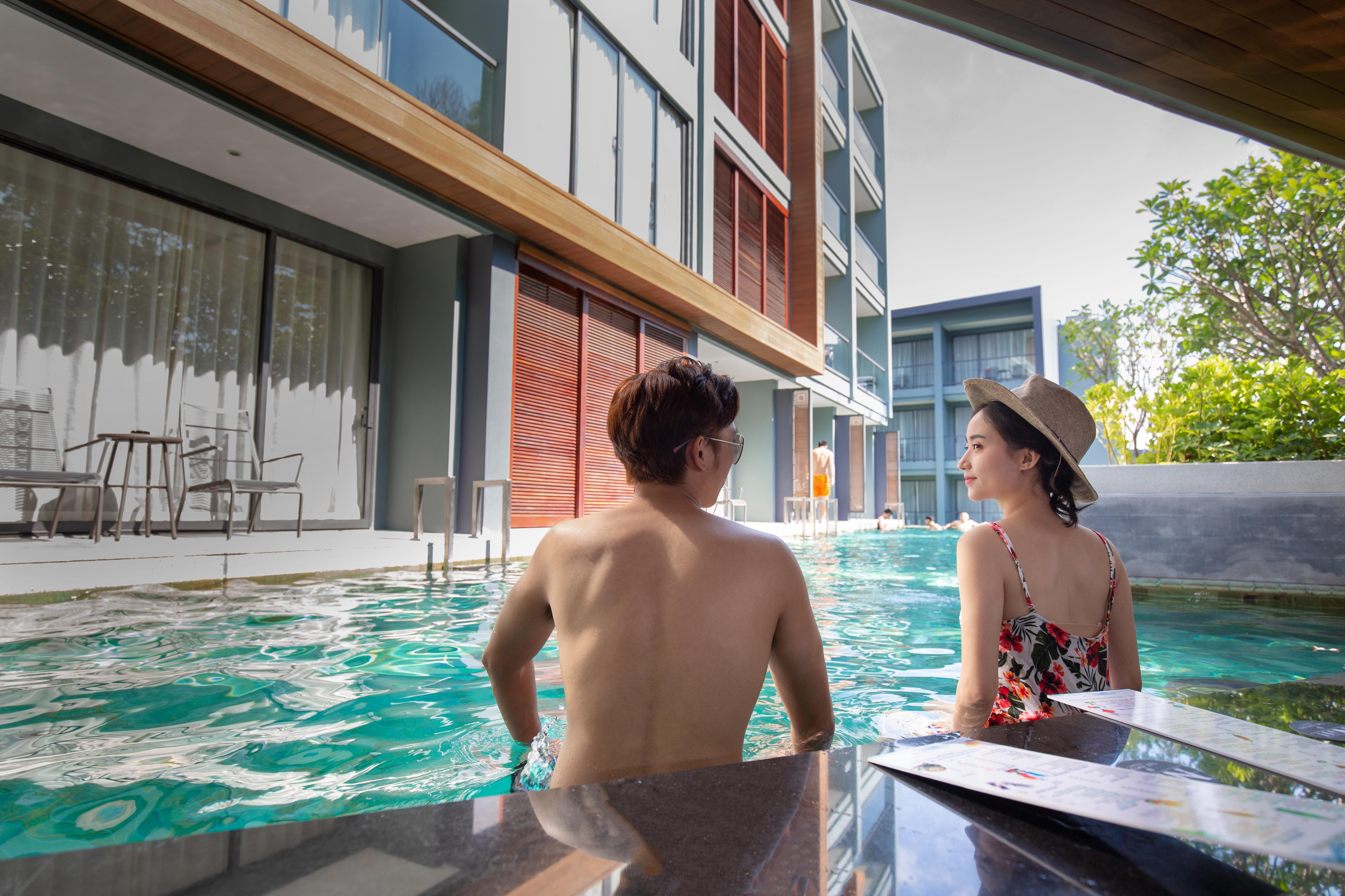 The Nature Phuket - Sha Extra Plus Exterior foto The swimming pool at the hotel