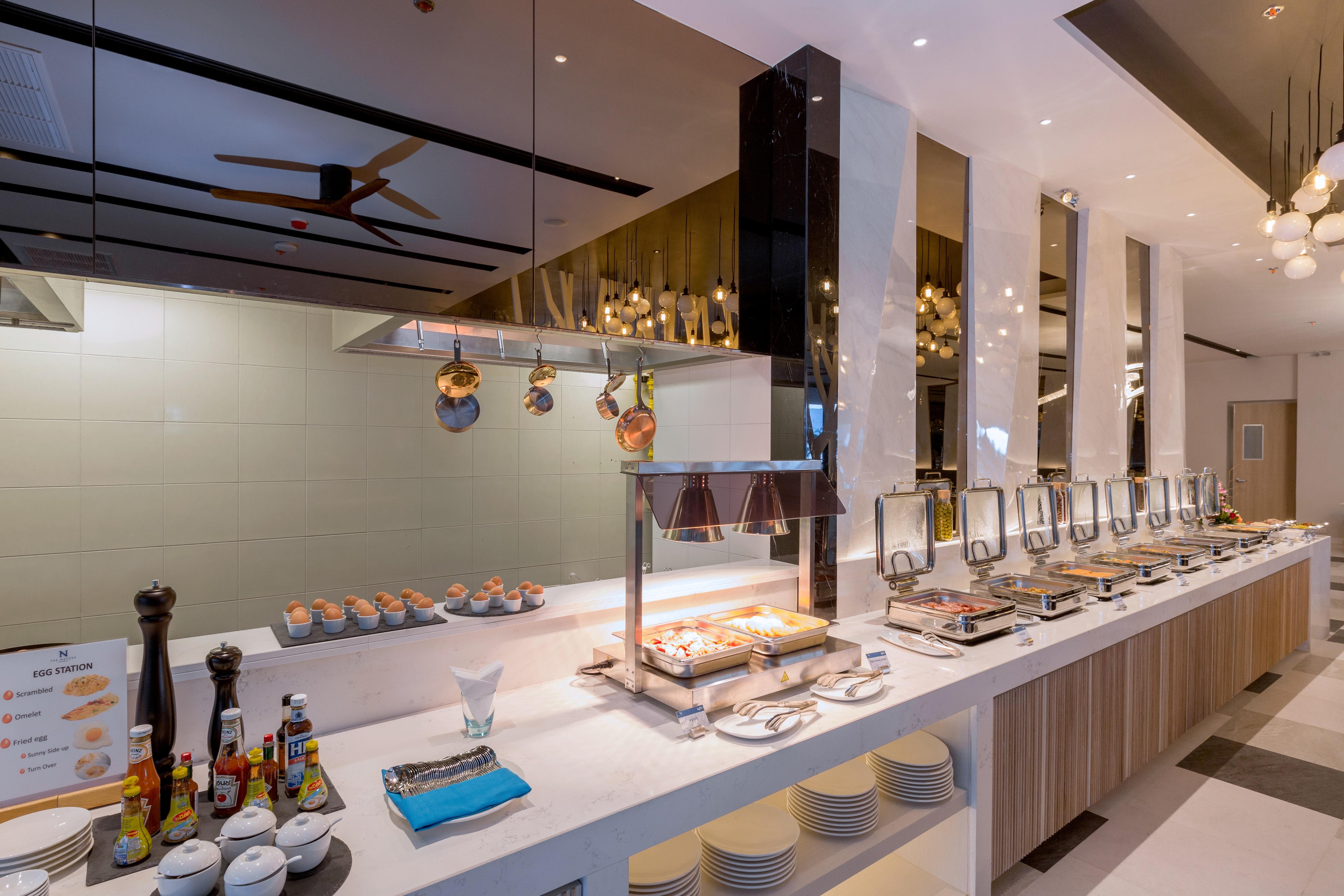 The Nature Phuket - Sha Extra Plus Exterior foto A buffet at a hotel