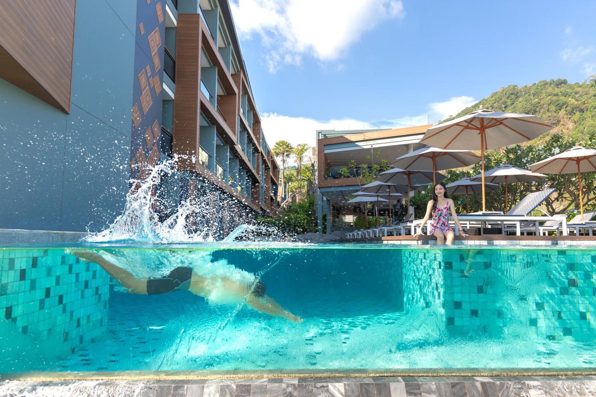 The Nature Phuket - Sha Extra Plus Exterior foto The swimming pool at the hotel
